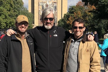 Christopher, Zachary, and me at Notre Dame Stadium in front of “Touchdown Jesus.”
